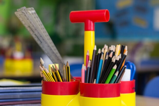 Pencils and pens in pots