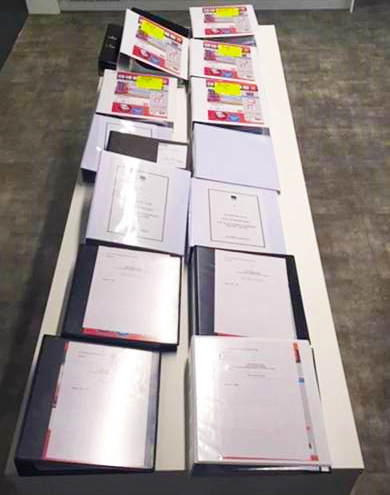 Binders full of evidence found by inspectors. 