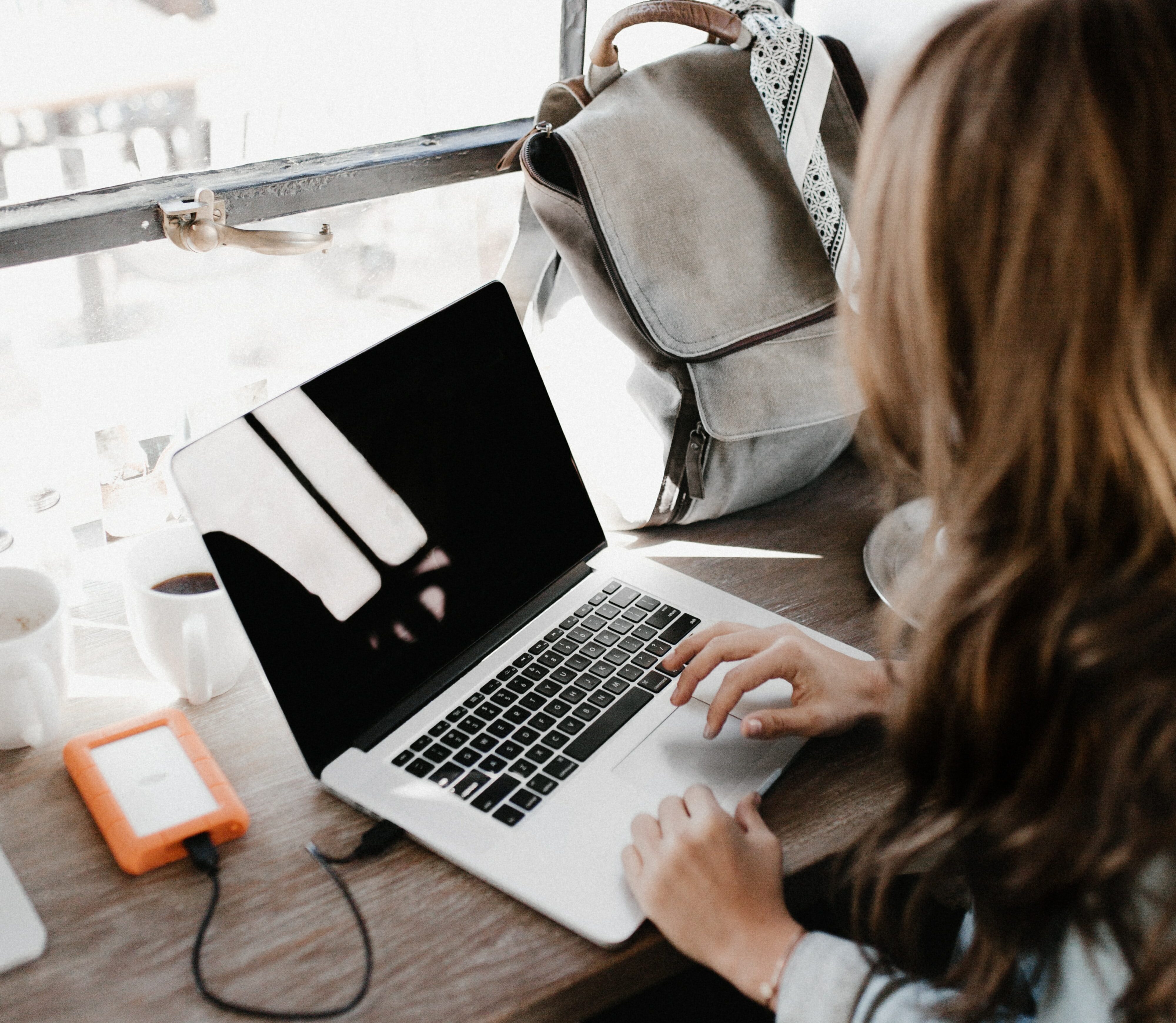 A woman using a laptop